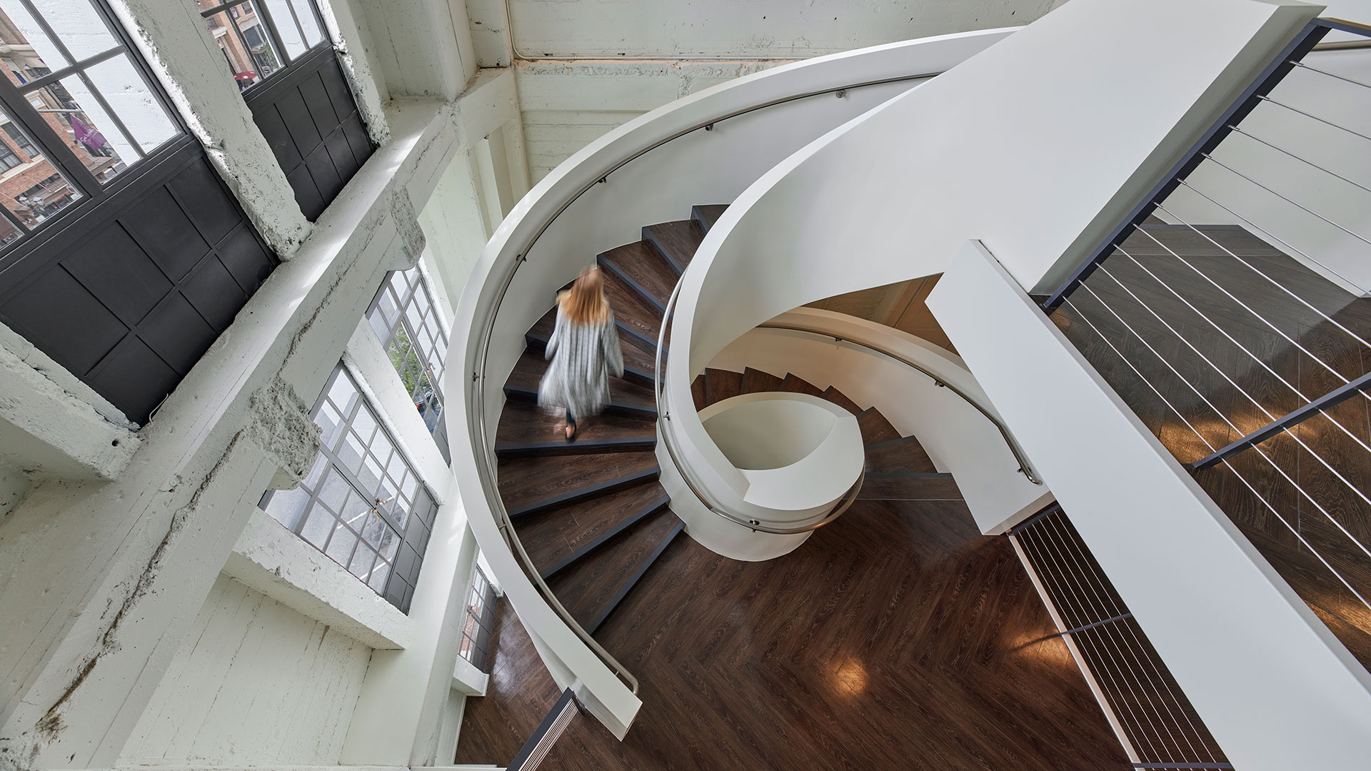 Luxury vinyl tile flooring in spiral staircase